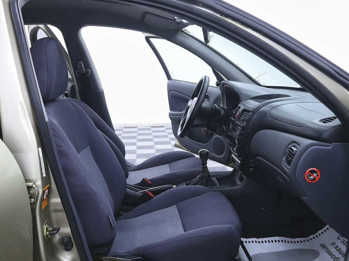 Nissan Almera 2004 года с пробегом. Фото: #10