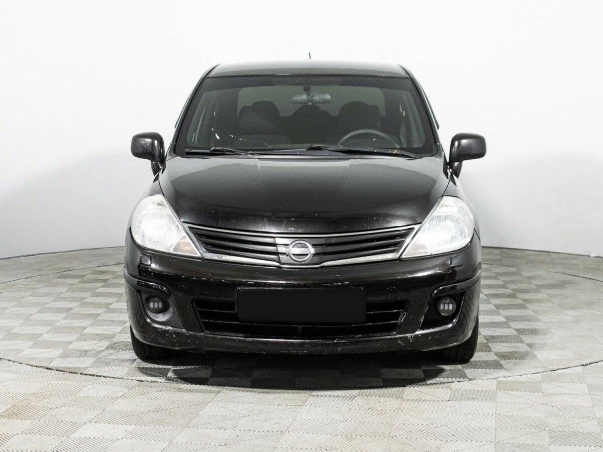 Nissan Tiida 2010 года с пробегом. Фото: #1