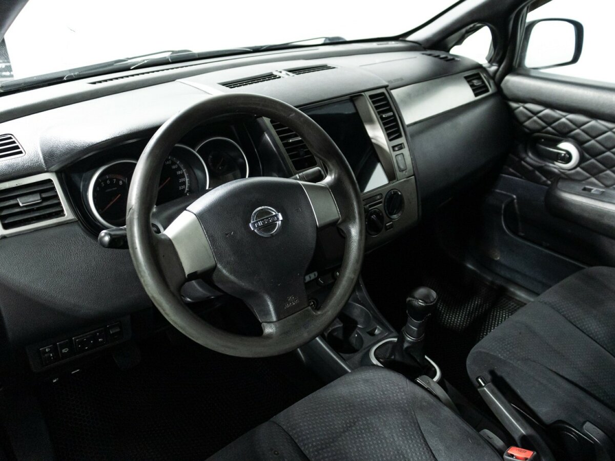 Nissan Tiida 2010 года с пробегом. Фото: #10